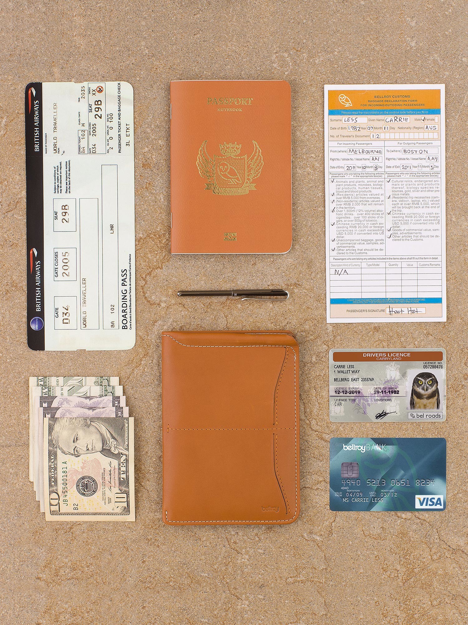 Bellroy Passport case in orange leather with micro pen